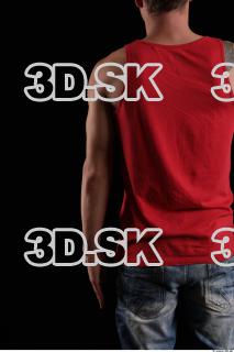 Arm flexing reference of body red shirt short jeans …